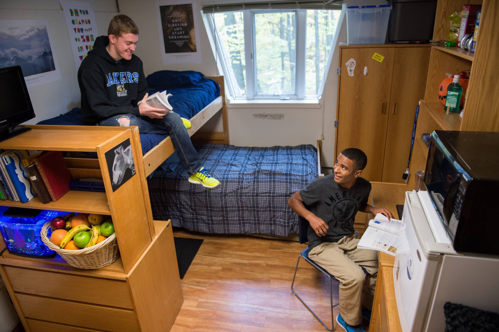 Students having a conversation in the apartment